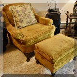 F127. Gold velvet chair and ottoman.